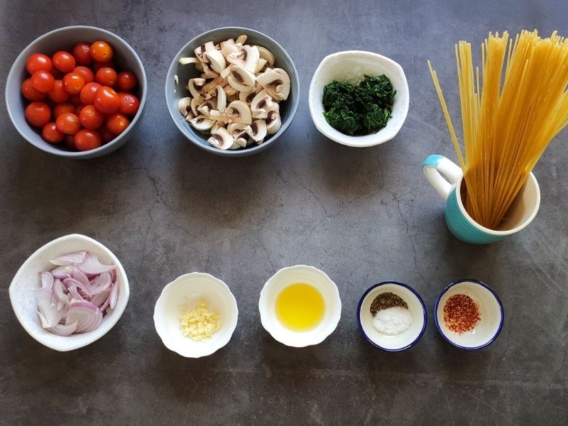 Ingredients to make Cherry tomato pasta with spinach