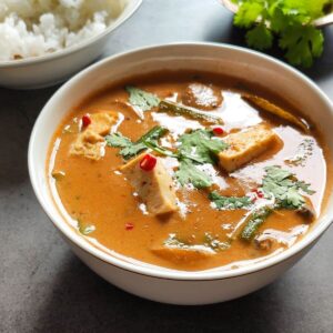 Vegetarian Thai red curry with tofu served in a white bowl