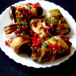 Armenian eggplant salad served on a white plate