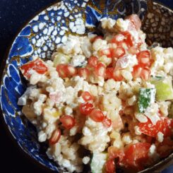 Egyptian farro salad served in a blue bowl