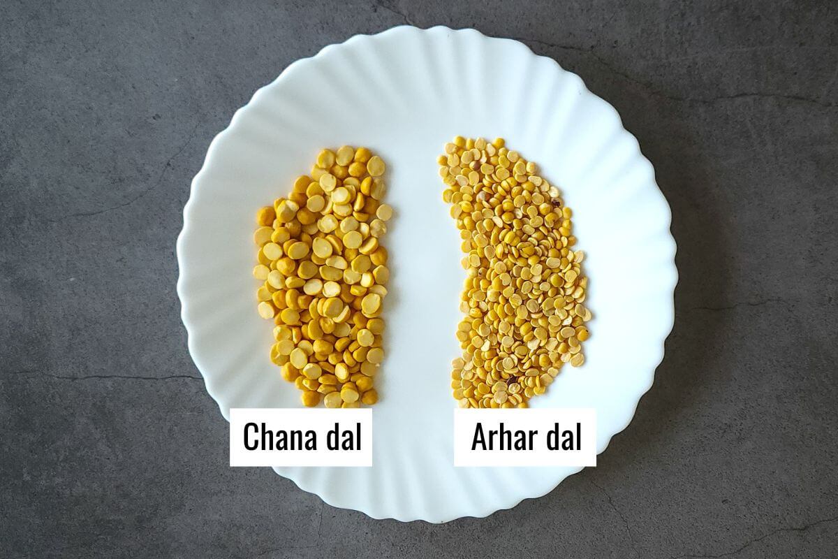 Chana dal and arhar dal labeled and kept side by side on a white plate.