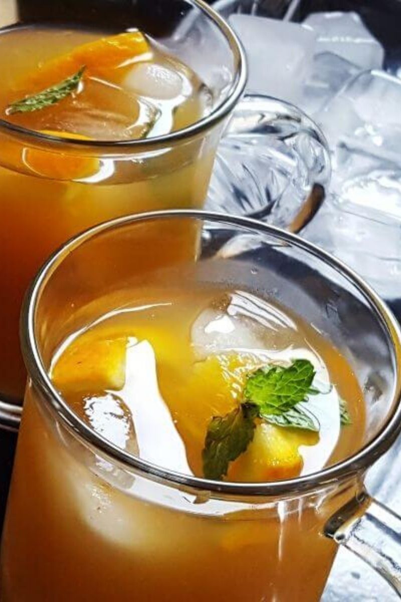 two glasses of orange iced tea