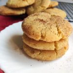 Pile of vegan snickerdoodle cookies served on a white plate
