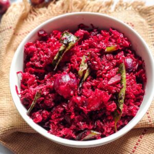 Beetroot Poriyal serve in a white bowl