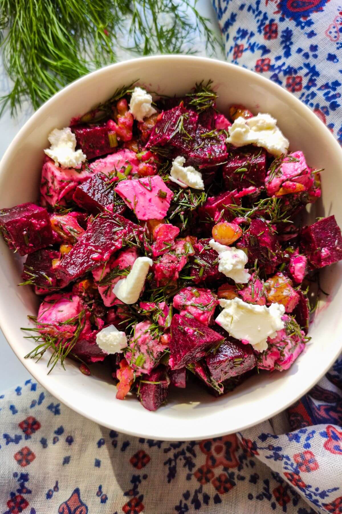 Beet Salad with feta served in a white bowl
