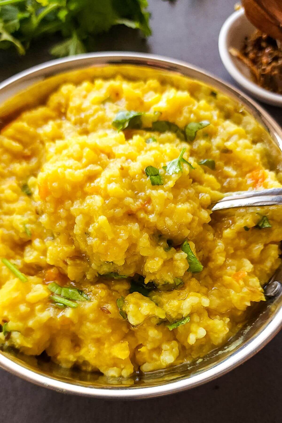 Close up shot of moong dal khichdi in a bowl.