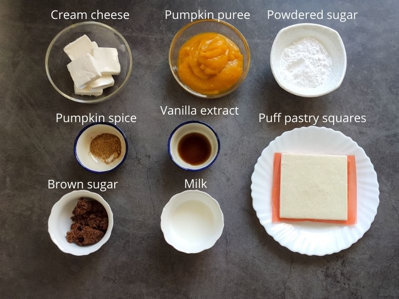 ingredients for pumpkin puff pastry on a grey surface