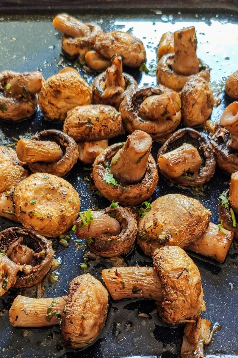 Baked butter mushrooms on a baking tray