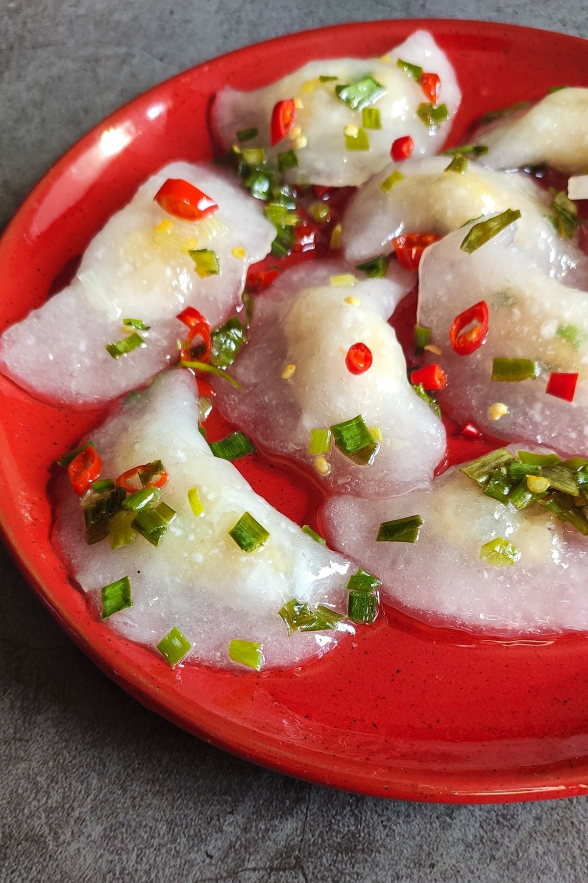 banh bot loc chay served on a red plate