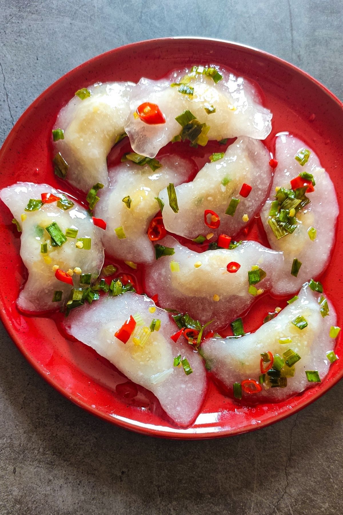 Vietnamese dumplings served on a red plate