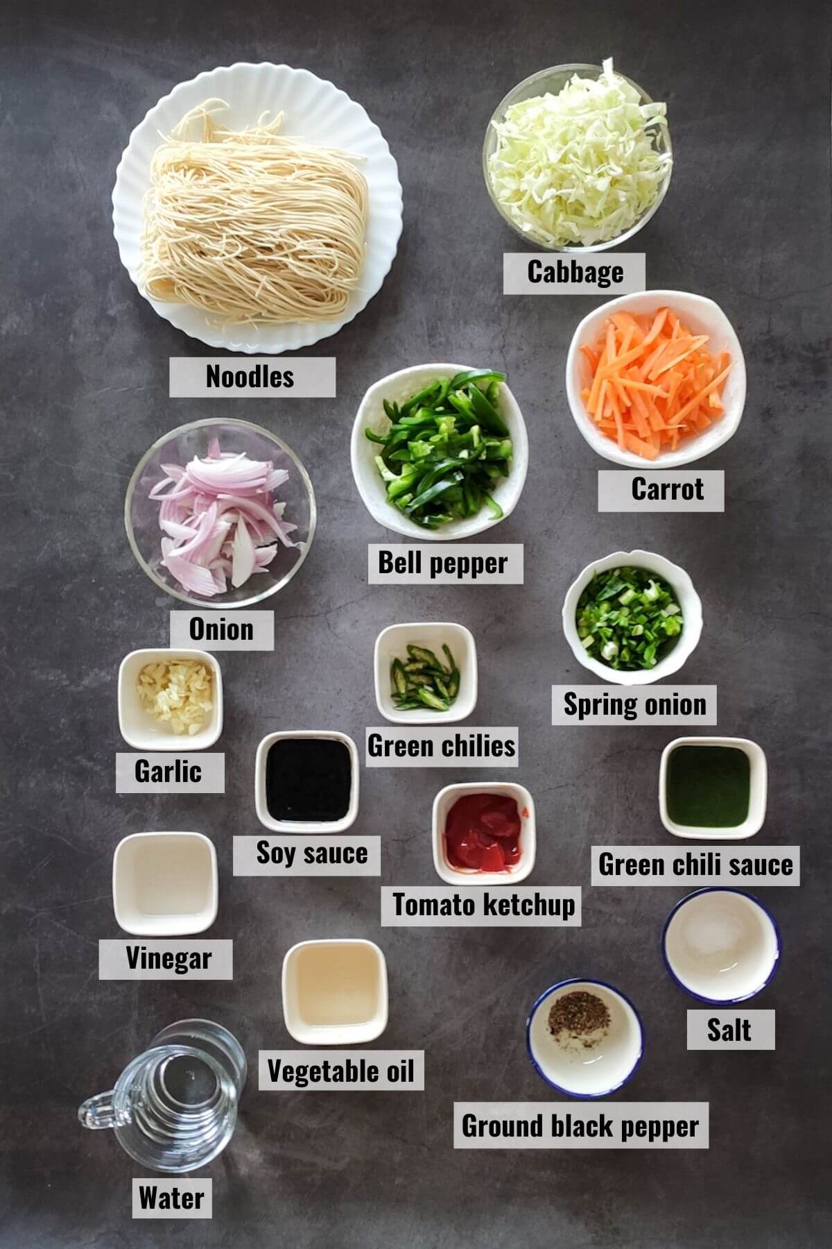 Ingredients required for making vegetable chow mein at home.
