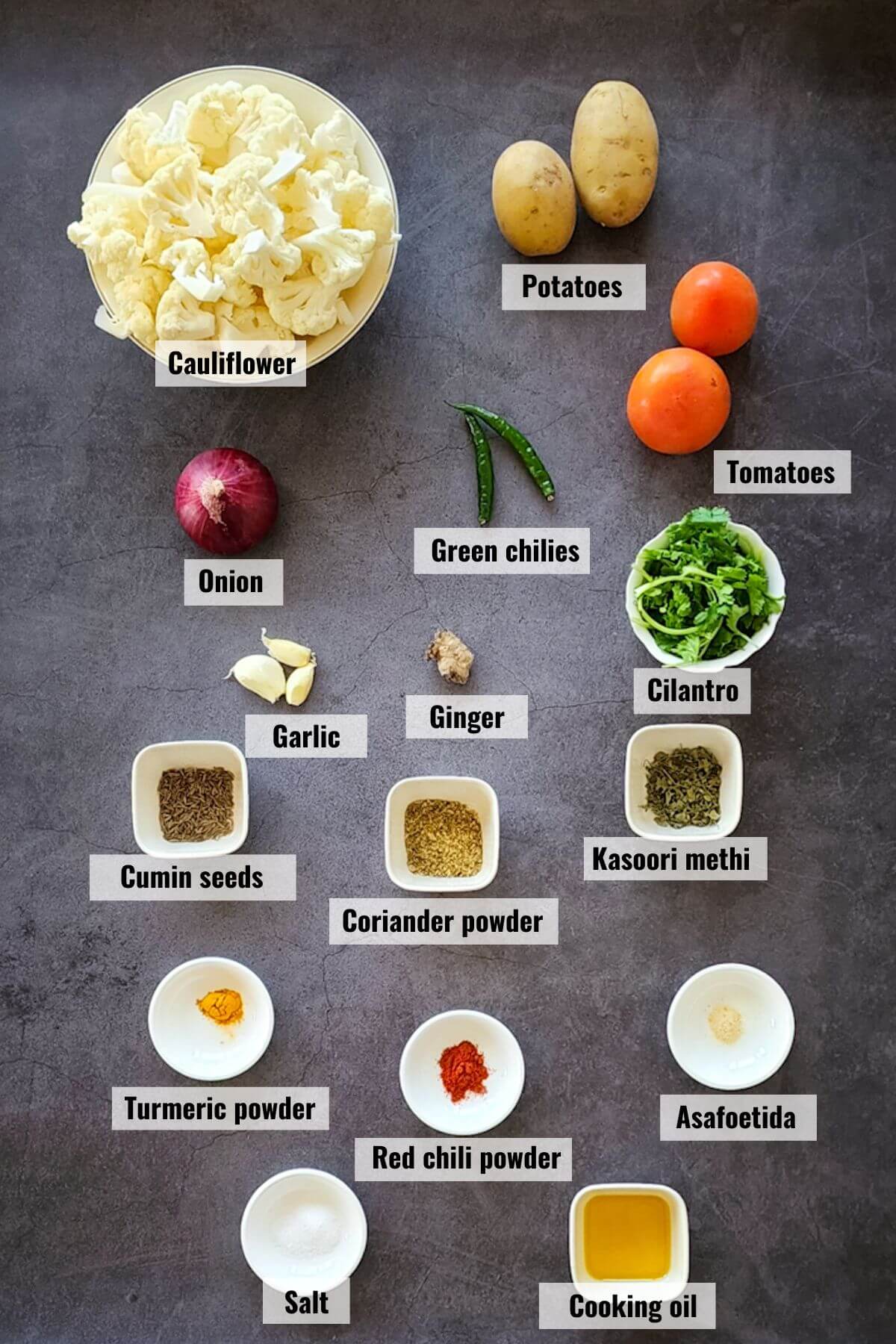 Ingredients required to make Indian style cauliflower and potatoes.