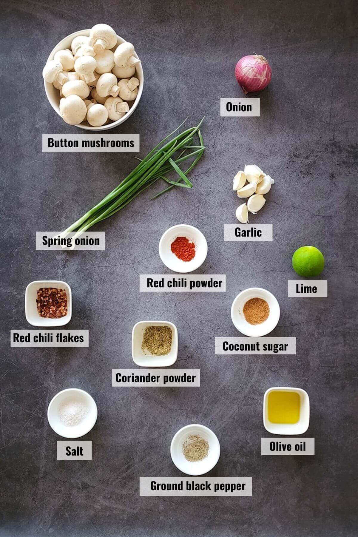Ingredients required to make spicy garlic mushrooms, labelled.