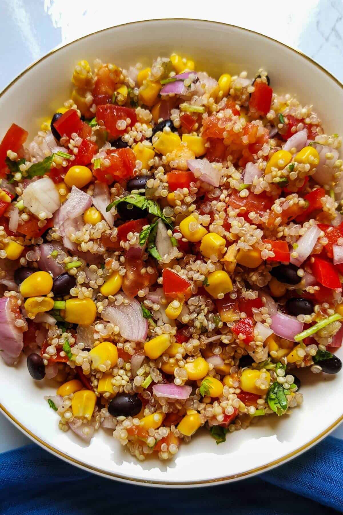 A bowl of Mexican quinoa salad with black beans.