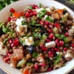 Lentil and feta salad served in a white bowl.