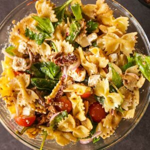 Sundried tomato pasta salad in a bowl.