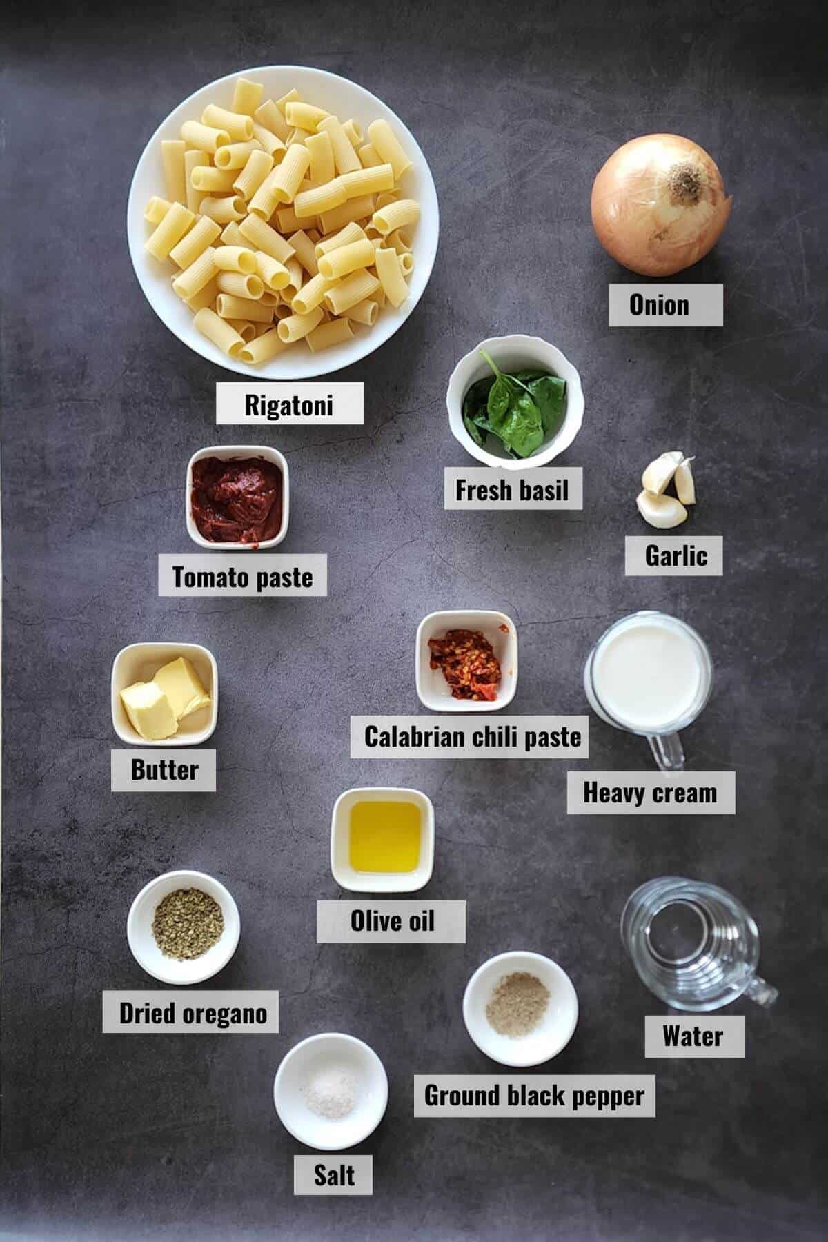 Ingredients required to make spicy rigatoni recipe, labeled.