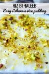 Lebanese rice pudding garnishes with roughly crushed pistachios.