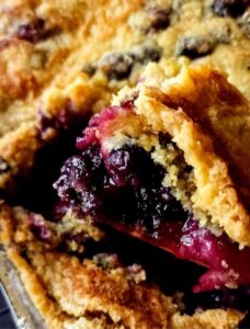 Mixed berries cobbler in a baking dish.