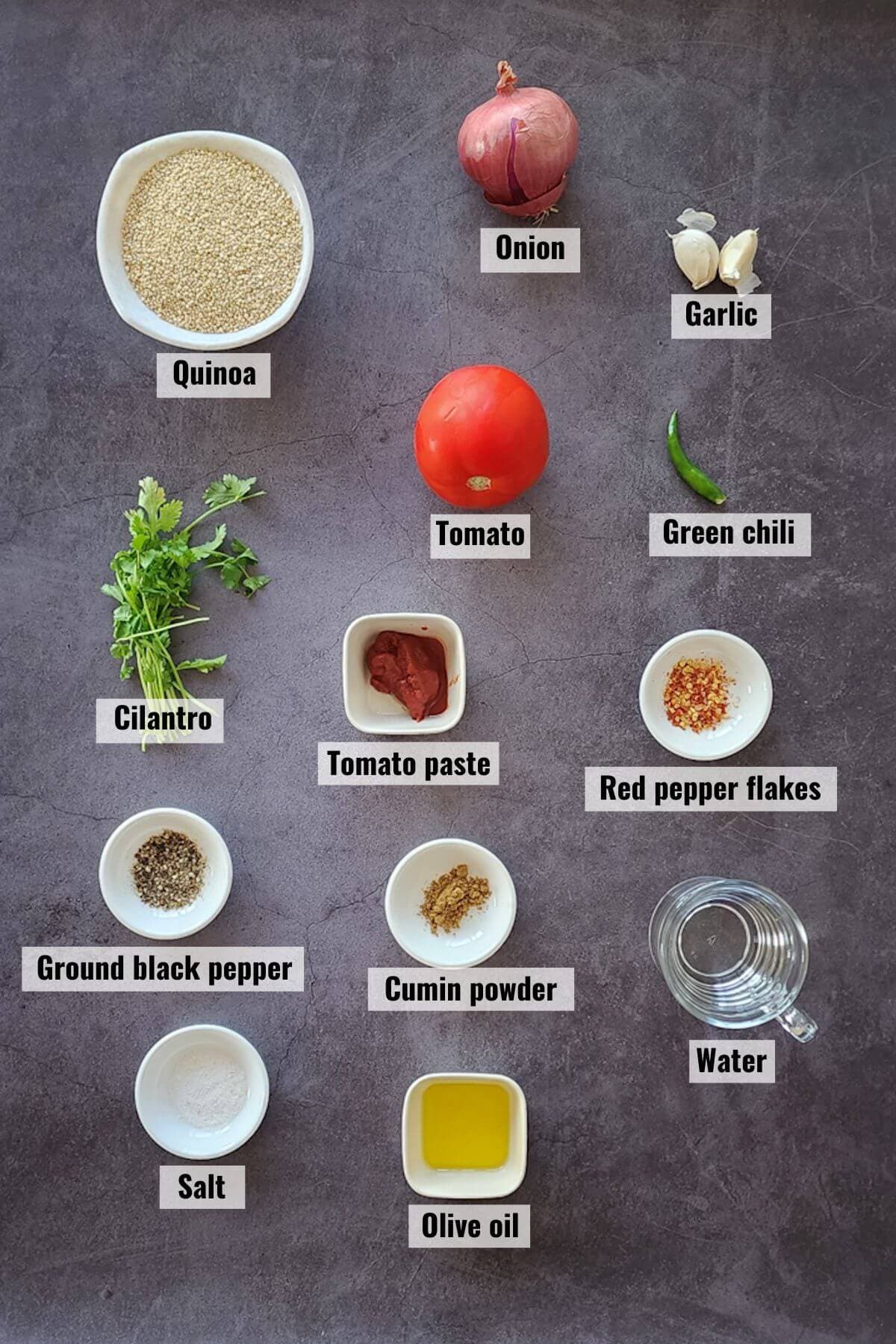 Ingredients required to make tomato quinoa recipe, labeled.