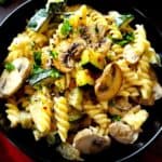 A bowl of mushroom zucchini pasta.