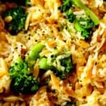 Broccoli au gratin rice a roni sprinkled with crushed black pepper.