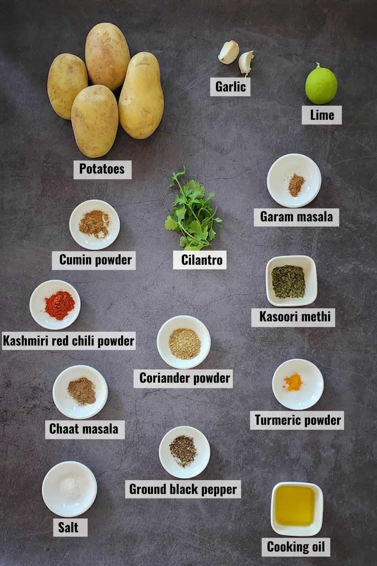 Ingredients required to make curry roasted potatoes, labeled.