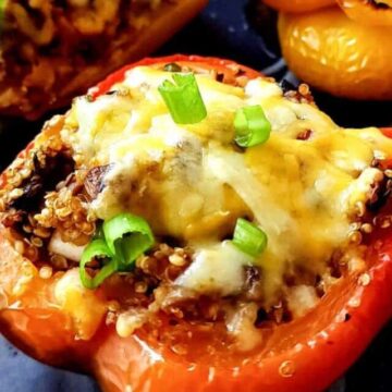 Close up shot of stuffed peppers with mushrooms.